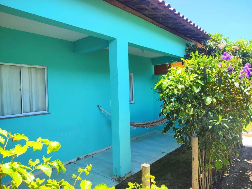 Varanda de casa com jardim